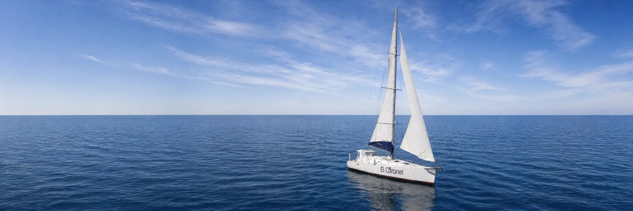 El Coronel sailing on calm open seas